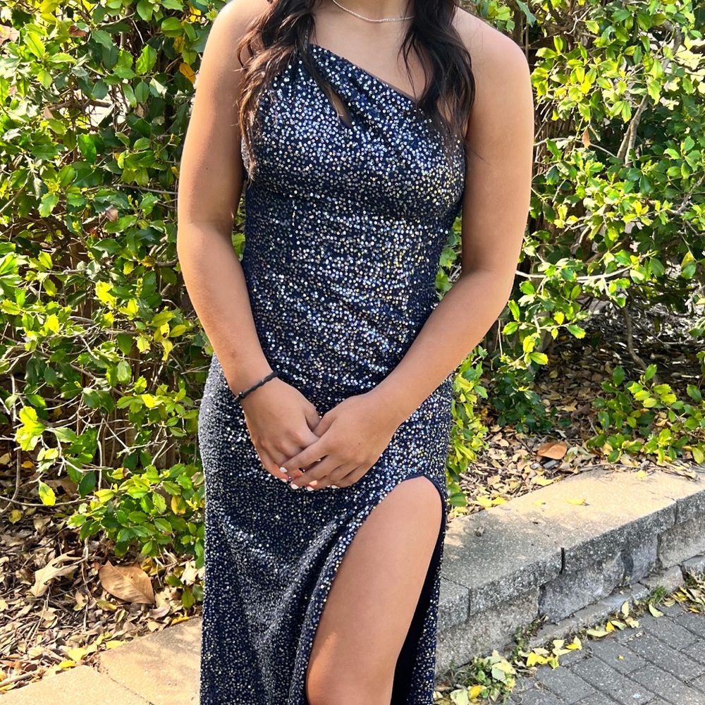 Size 2 dark navy formal dress. Worn once. Model is 5’6” tailored bra cups inside